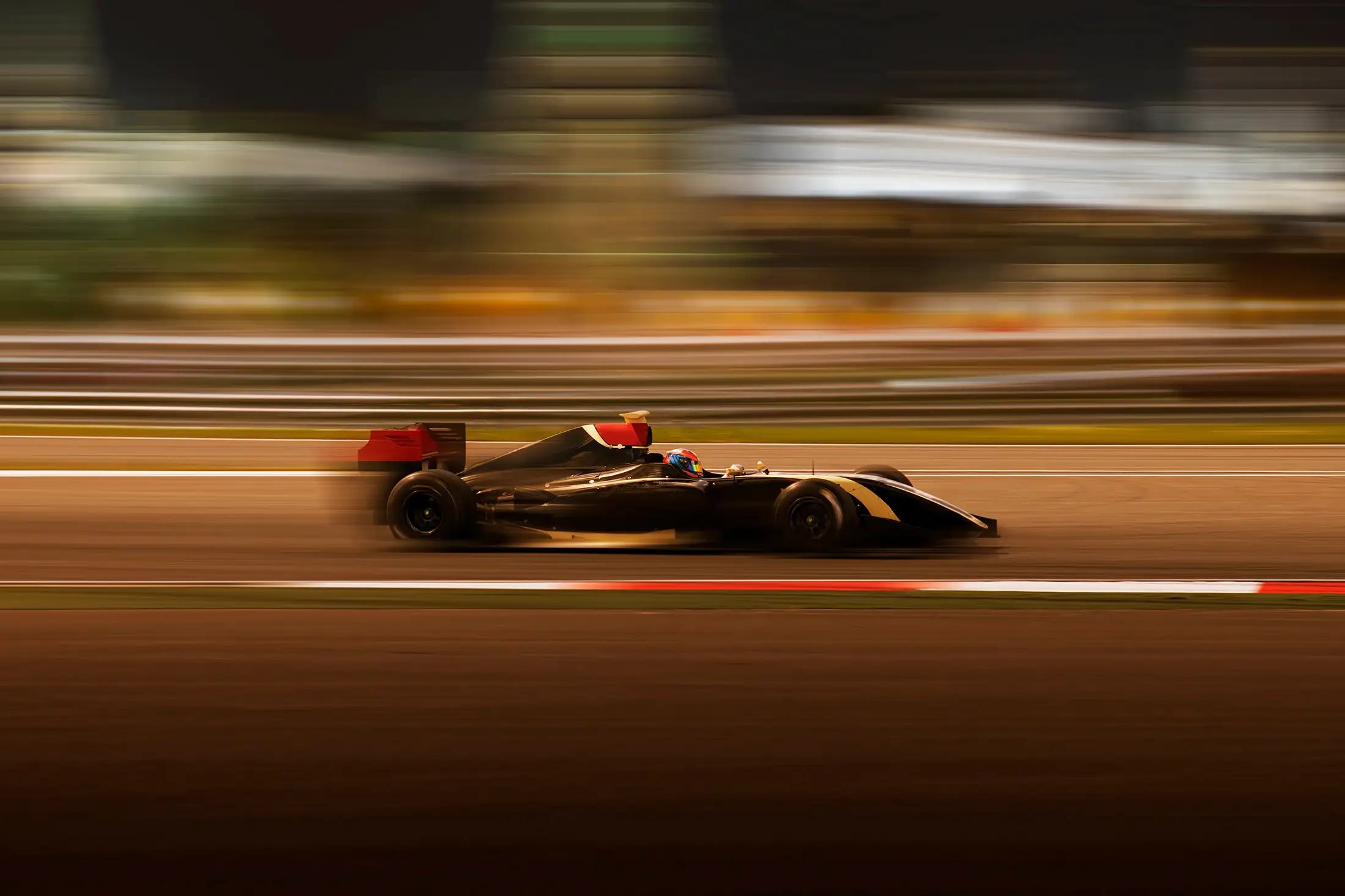 Sporting Goods & High-Performance Pressure Vessel Solutions Race car racing at high speed