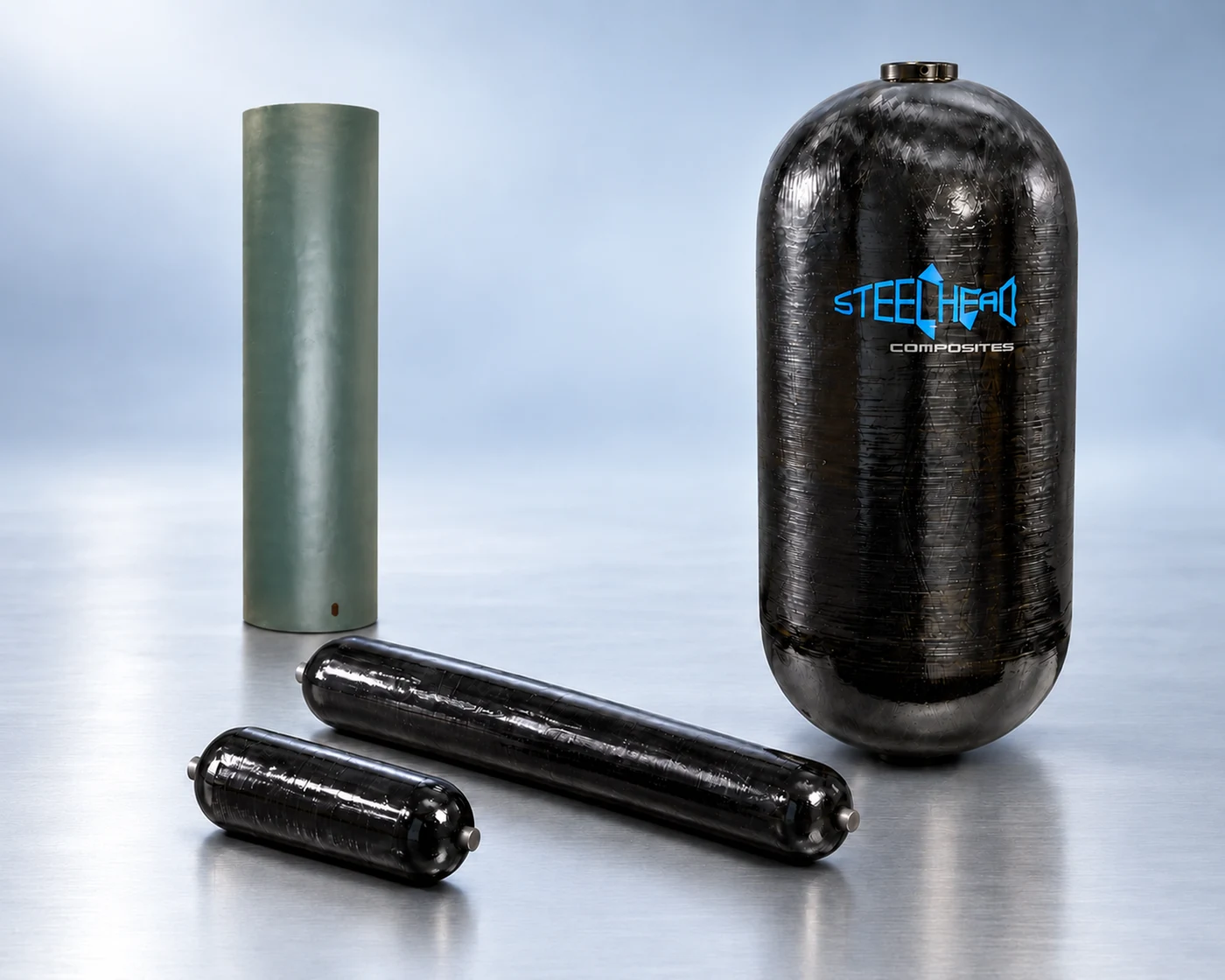 Steelhead pressure vessels and gray-green composite casing in representative configurations; not to scale.