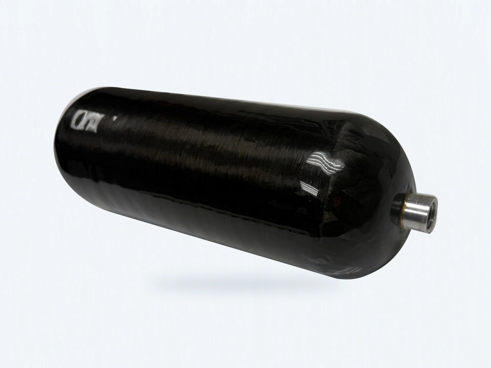 Scout compact carbon-composite vessel with its original silver port and winding surface.