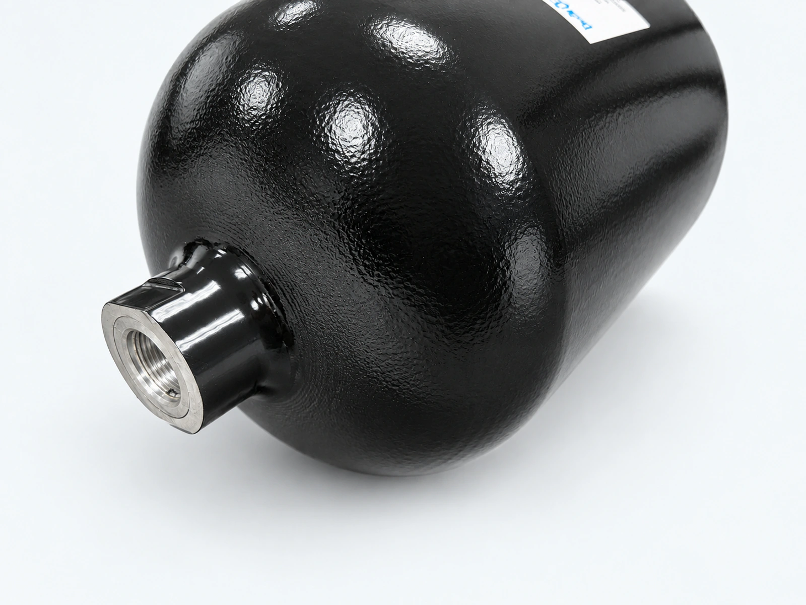 Black-coated Keep vessel with a machined silver threaded port, shown in a close three-quarter view.