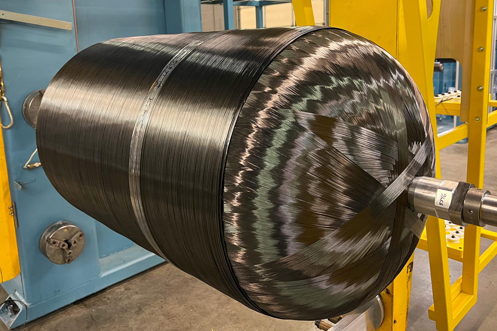 Type 4 CNG pressure vessel certified to NGV2:2023 being finished on a 4-axis filament winding machine at 3600 psi rating.