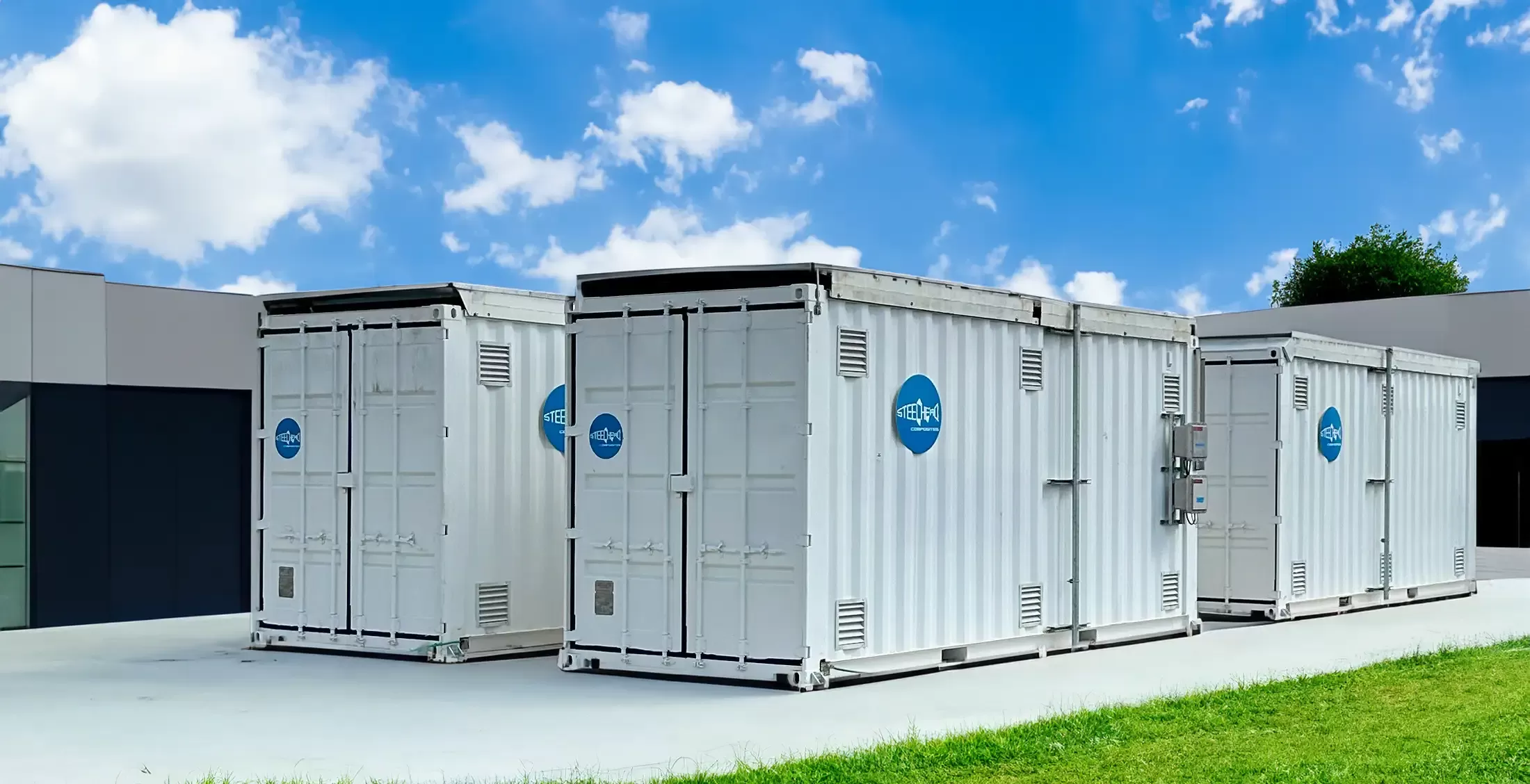 Photo of HydrogenCube™ Containerized Storage in front of a research building.